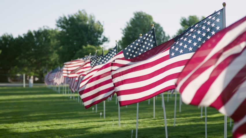 American Flags at Sunset Slow Motion in a Park Setting