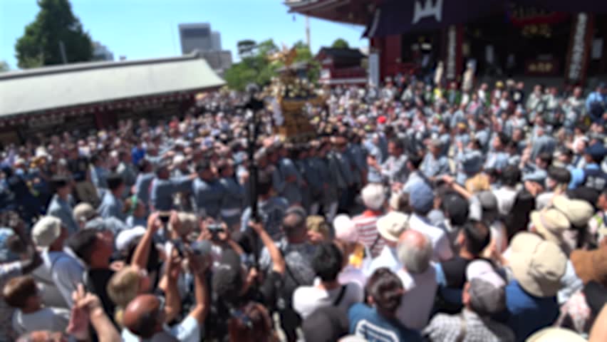 ASAKUSA, TOKYO, JAPAN - 18 MAY 2024 : Scenery of SANJA MATSURI (SANJA FESTIVAL) in Asakusa city. Festival is one of the three great shinto festivals in Tokyo. Japanese summer festival concept video.