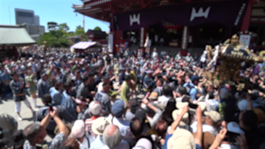 ASAKUSA, TOKYO, JAPAN - 18 MAY 2024 : Scenery of SANJA MATSURI (SANJA FESTIVAL) in Asakusa city. Festival is one of the three great shinto festivals in Tokyo. Japanese summer festival concept video.