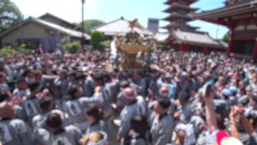 ASAKUSA, TOKYO, JAPAN - 18 MAY 2024 : Scenery of SANJA MATSURI (SANJA FESTIVAL) in Asakusa city. Festival is one of the three great shinto festivals in Tokyo. Japanese summer festival concept video.