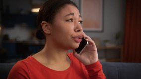 Sad upset painful feeling bad suffering ache pregnant woman African American female girl suffer problem ill sick unhealthy health trouble home discomfort pain medicine talking mobile phone call talk - Powered by Shutterstock - Get 15% off with code: PIKWIZARD15