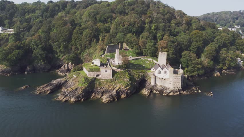 A drone view of the historic Dartmouth Castle at the mouth of the River Dart, with the town of Dartmouth in the background, south coast of Devon, southwest England, United Kingdom, Europe
