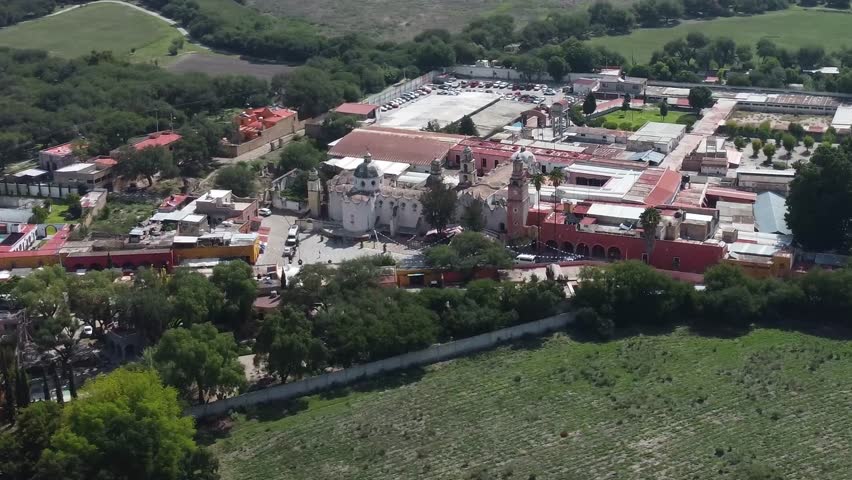 Atotonilco, mexico, showcasing historic buildings and lush greenery, aerial view