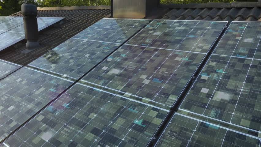 Futuristic data and electricity moving on solar panels on a smart home roof - Powered by Shutterstock - Get 15% off with code: PIKWIZARD15