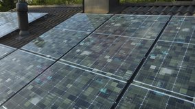Futuristic data and electricity moving on solar panels on a smart home roof - Powered by Shutterstock - Get 15% off with code: PIKWIZARD15