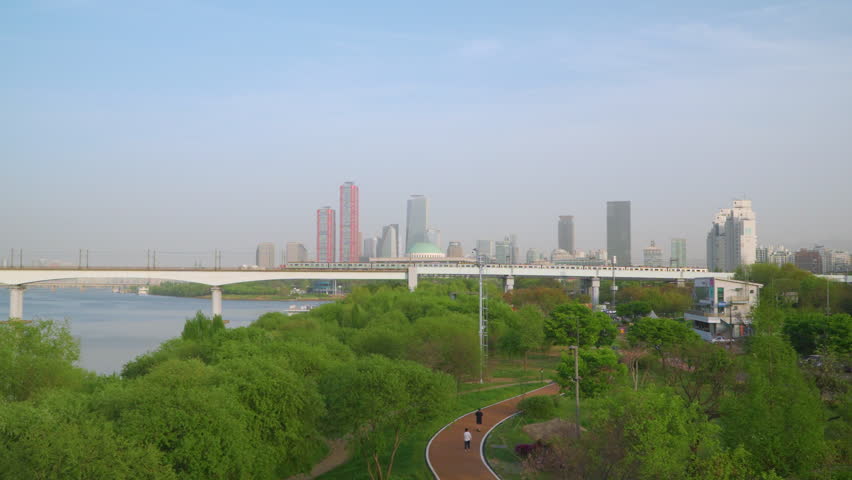 Train Moving On Dangsan Railway Bridge In Fog In Yeongdeungpo, Seoul, South Korea. wide shot