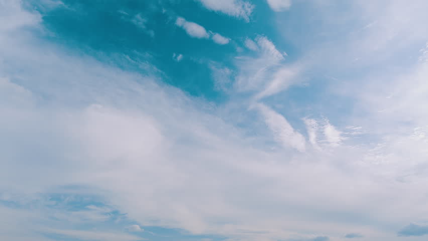 Sky with bautiful silky clouds. Puffy fluffy cirrus clouds.