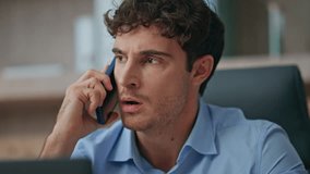 Frustrated guy calling smartphone in home office closeup. Unhappy customer solve discussing problem on cellphone conversation. Nervous manager emotional businessman talking mobile phone indoors. - Powered by Shutterstock - Get 15% off with code: PIKWIZARD15