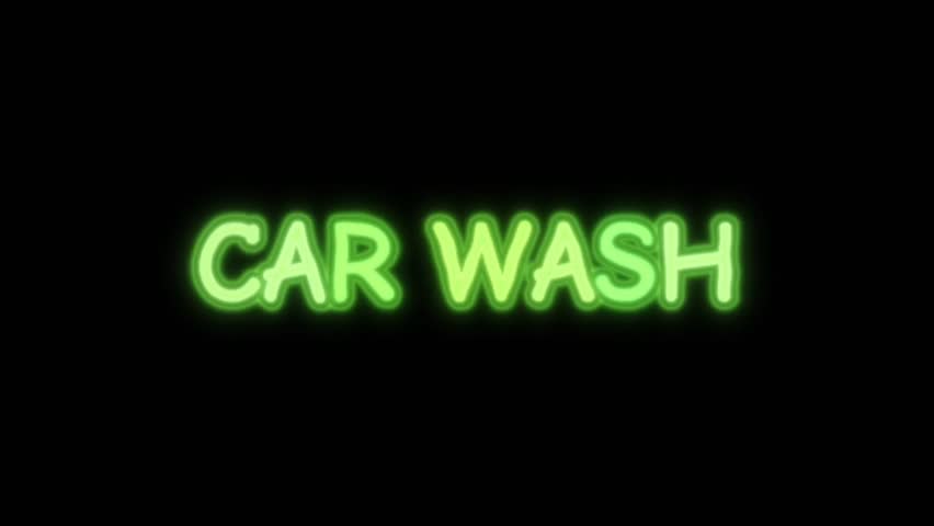 Animated footage of green color car wash text with black bcakground
