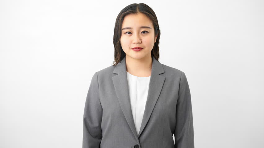 
Business image of a young woman wearing a business suit