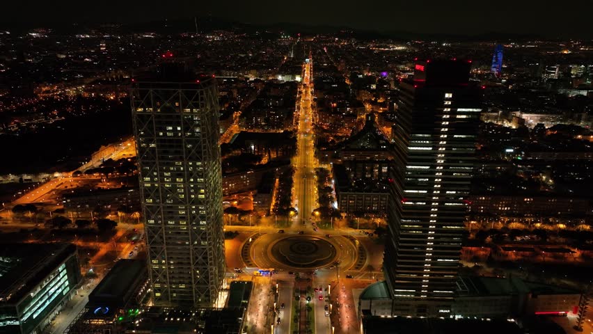 Aerial drone panorama of Villa Olimpica del Poblenou, in the city of Barcelona. Twin skyscrapers of Hotel Arts and Torre Mapfre next to Port Olimpic.	
