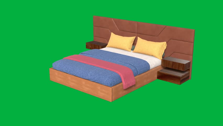 A bed with a green background and a brown headboard. The bed is made with a blue comforter and pillows