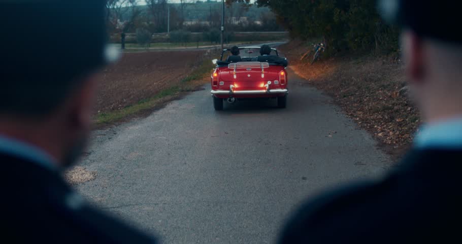 Vintage Police Officier Salute Old Vintage Car Driving Away