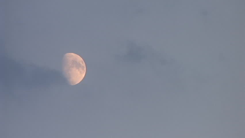 3/4 moon at dusk & few clouds