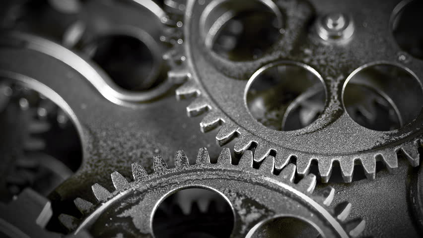 Loop of Cogs Wheel Metallic Gears Background Footage.