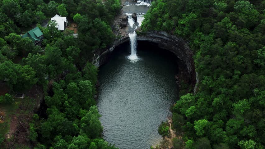 Ascend above the treeline to witness the splendor of Desota Falls from the sky. This aerial image captures the full glory of the falls, set against the rugged backdrop of Alabama’s landscapes. 