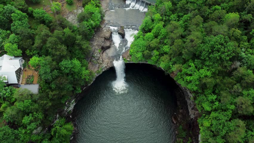 Ascend above the treeline to witness the splendor of Desota Falls from the sky. This aerial image captures the full glory of the falls, set against the rugged backdrop of Alabama’s landscapes. 