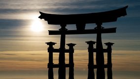 Traditional Japanese Torii Gate, Time Lapse at Sunset with Colorful Clouds, Hatsukaichi, Japan - Powered by Shutterstock - Get 15% off with code: PIKWIZARD15