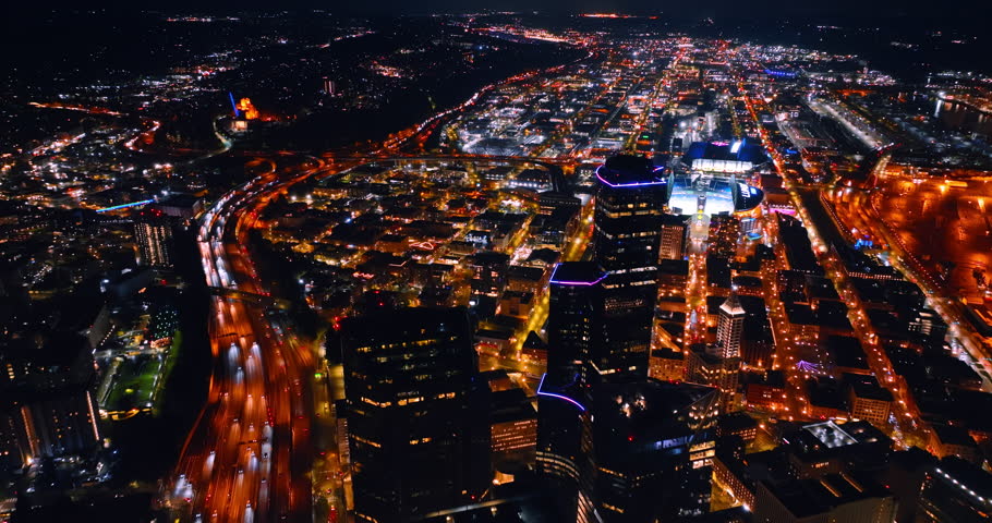 Vibrant city with amazing illumination at night. Top view of Seattle, Washington, the USA.