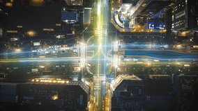 Dynamic city intersection at night with light trails and data overlays, showcasing a fast paced urban environment and augmented reality view - Powered by Shutterstock - Get 15% off with code: PIKWIZARD15