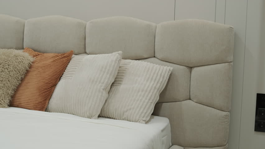 Cozy Bedroom Detail with Stylish Textured Pillows