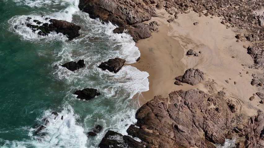 One minute of 4k video of waves on the wild beach. No people, just waves and rocks. Nice background 