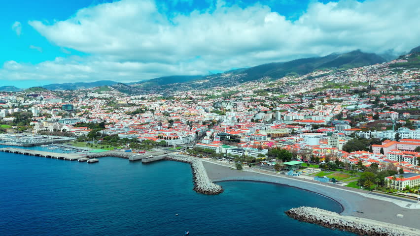 Panoramic view of Funchal City and Harbor on Sunny day at Madeira Island Portugal