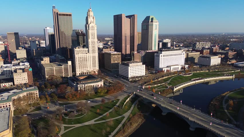 Columbus, Ohio skyline with Scioto River. Aerial drone. Autumn with reflections of the downtown skyline in the Scioto River