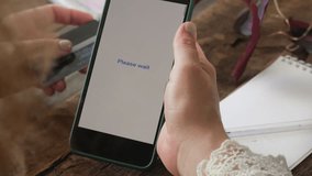 Online shopping, credit card payment. Paying using mobile phone and plastic bank card. Transaction confirmation on mobile app display. - Powered by Shutterstock - Get 15% off with code: PIKWIZARD15