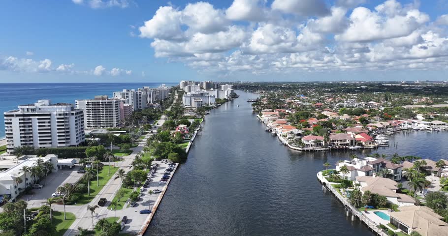 BOCA RATON, FLORIDA USA– 2024-05-25 Aerial luxurious waterfront homes, high-rise condominiums, and commercial buildings. beach. 