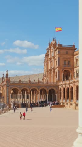 Spanish Square or Plaza de Espana in Seville, Spain. Camera slowly moves through the beautiful arcade of the Plaza de Espana palace in Sevilla, Andalusia, Spain. Slow motion steadicam footage
