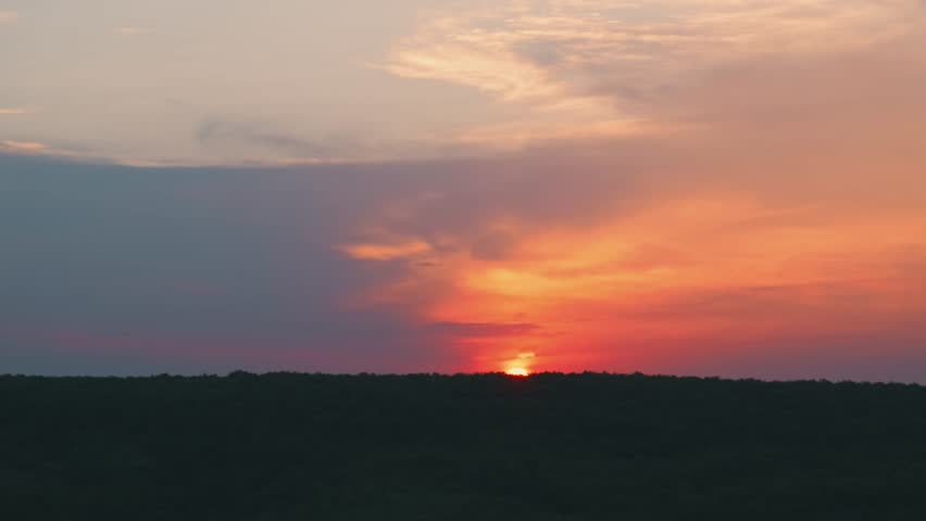 Stunning Sunset over the Horizon, filled with vibrant colors and a serene atmosphere
