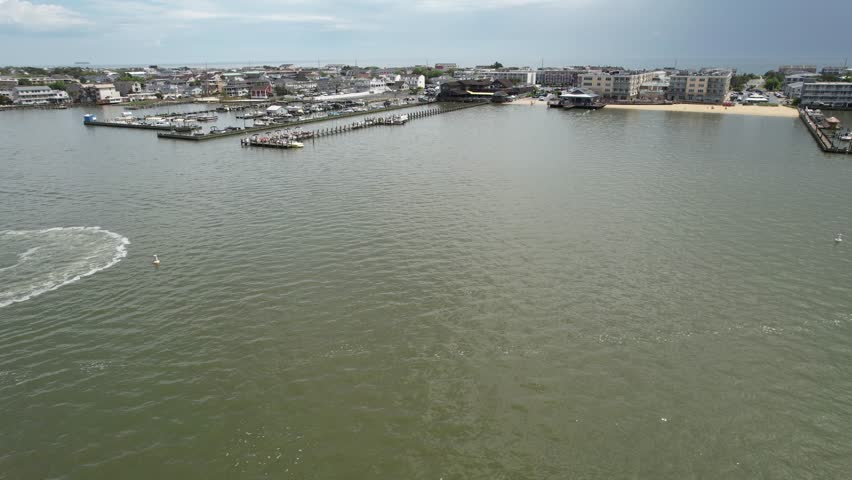 long rising drone bay to ocean Dewey Beach Delaware sunny summer day 