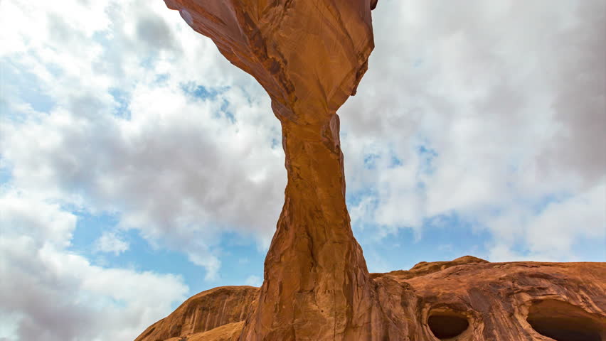 Clouds Over Corona Arch In Utah, USA - Timelapse