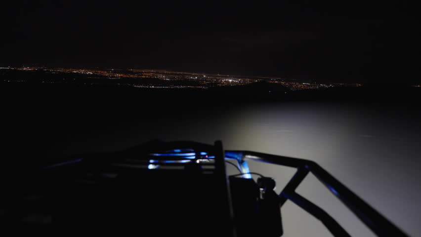 POV BOOGIE CROSSING THE DESERT OF HUACACHINA PERU AT NIGHT