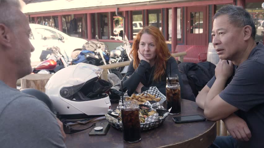 Video of Motorcyclists chatting outside bar