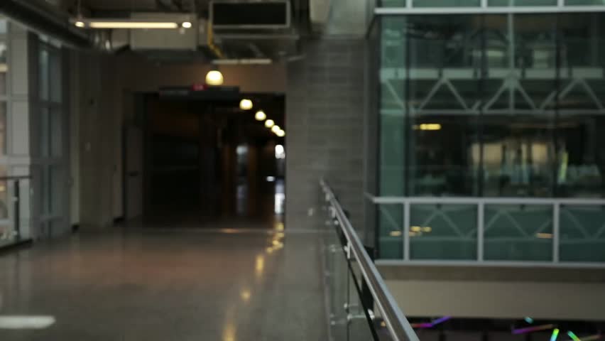 Confident businesswoman on office balcony