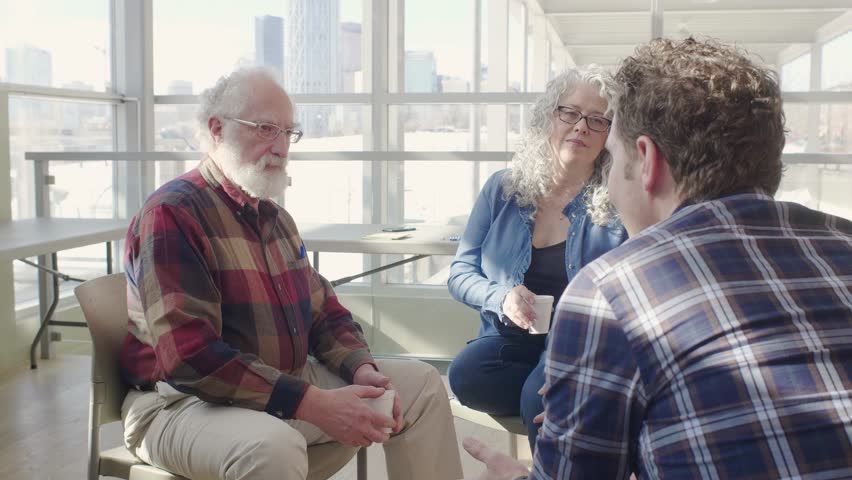 Support group meeting in community center