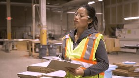 Worker checking stocks in distribution warehouse - Powered by Shutterstock - Get 15% off with code: PIKWIZARD15