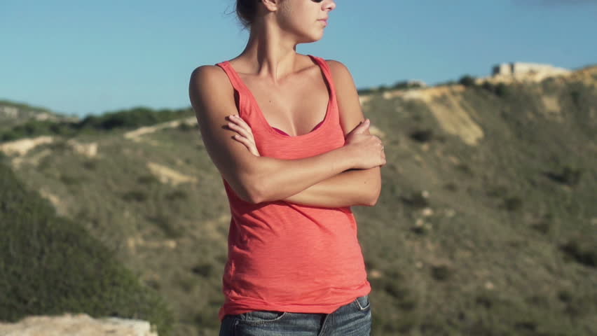 Young pensive woman outdoors, super slow motion, shot at 240fps

