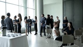 Business people networking at conference - Powered by Shutterstock - Get 15% off with code: PIKWIZARD15