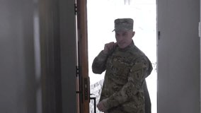 Happy family greeting soldier returning home - Powered by Shutterstock - Get 15% off with code: PIKWIZARD15