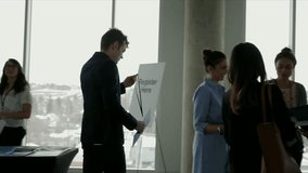 Business people networking at business conference - Powered by Shutterstock - Get 15% off with code: PIKWIZARD15