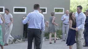 Happy couples dancing at wedding reception in parking lot - Powered by Shutterstock - Get 15% off with code: PIKWIZARD15