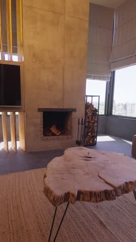 Living room Norway cottage home style indoor room Fireplace graces room with concrete wall, embodying loft minimalist style home interior design of modern living room equipped with TV panorama view