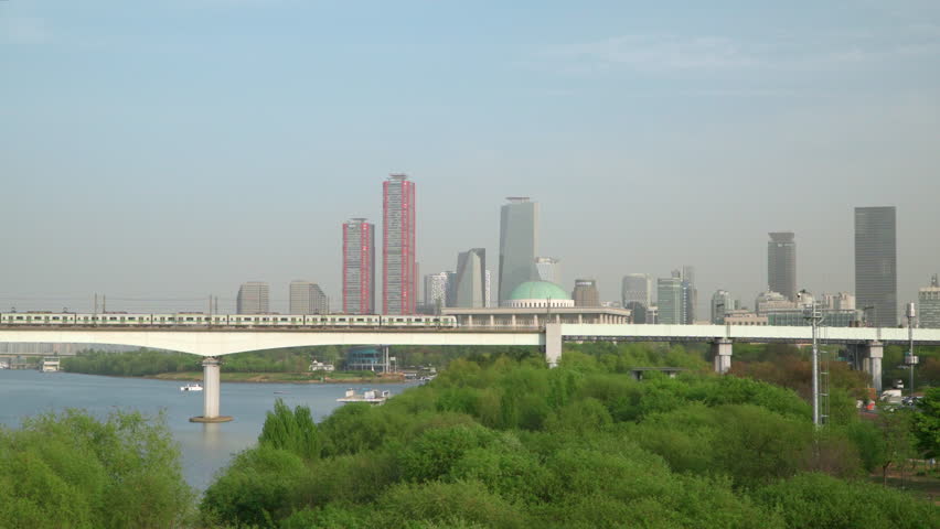National Assembly of the Republic of Korea, Dangsancheolgyo Railway Bridge with Train Moving Towards Metro Dangsan Station, Hangang Park, and Downtown of Yeouido Financial District, Yeongdeungpo