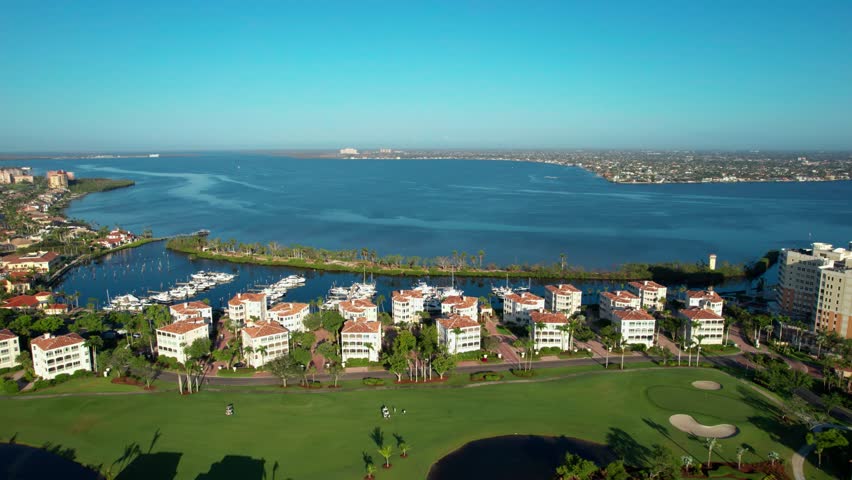 Drone aerial view of condos on the shoreline of the Caloosahatchee River