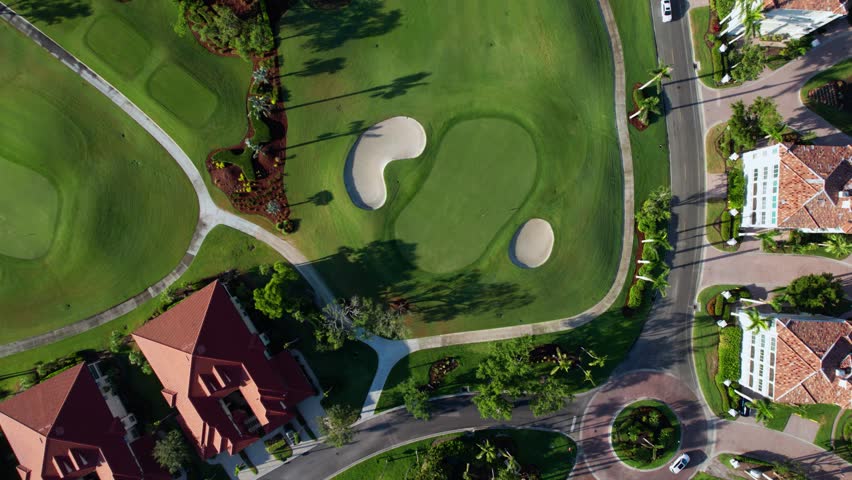 Aerial drone shot looking straight down at a golf course in Florida