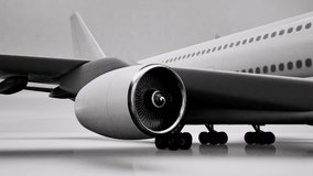 White airplane 3D model on white background, 3D animation, camera zoom out - Powered by Shutterstock - Get 15% off with code: PIKWIZARD15