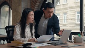Asian Korean woman office businesswoman female girl work paperwork documents analyze Chinese man Japanese businessman male guy business leader come in angry talk dissatisfied bad result scold laptop - Powered by Shutterstock - Get 15% off with code: PIKWIZARD15